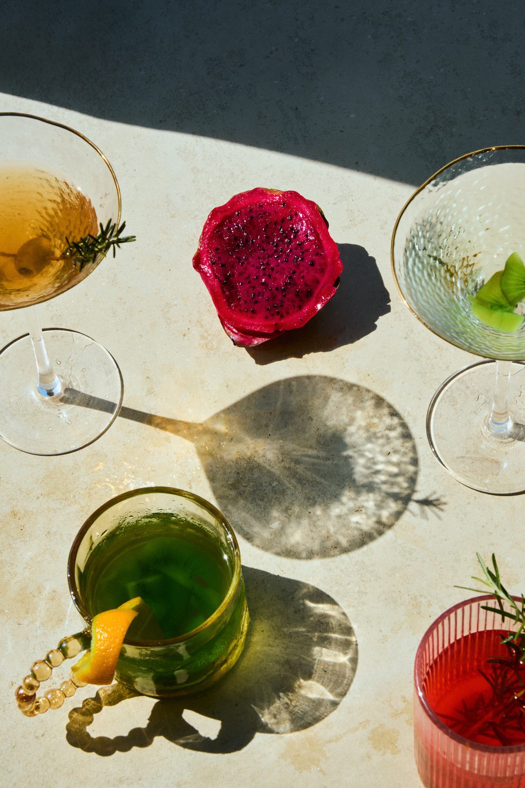Cocktails and dragon fruit in sunlight